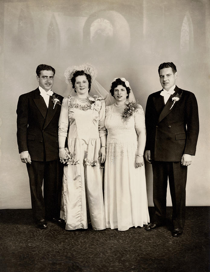 Portrait of Two Brides and Two Grooms Photograph by Digital Vision.