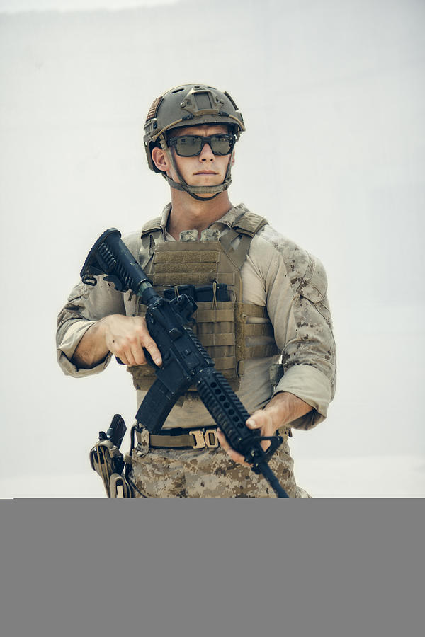 Portrait of United States Marine on patrol.` Photograph by Michael Sugrue