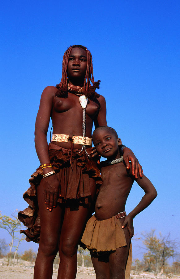 Portrait of woman and girl from Himba tribe. Photograph by Frans Lemmens