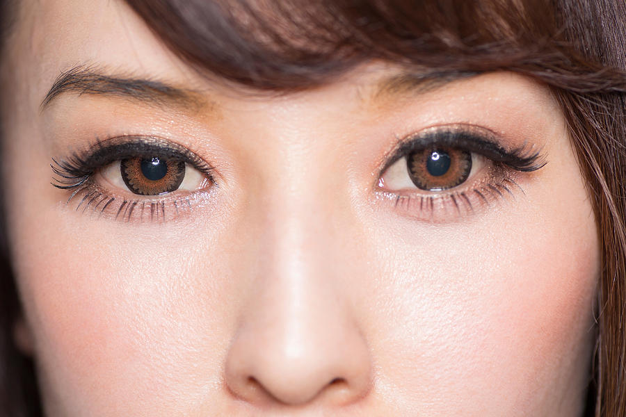 Portrait of woman with brown eyes close up Photograph by Takamitsu GALALA Kato