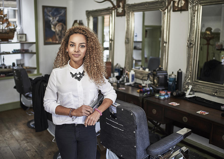 Portrait of young female barber Photograph by Mike Harrington