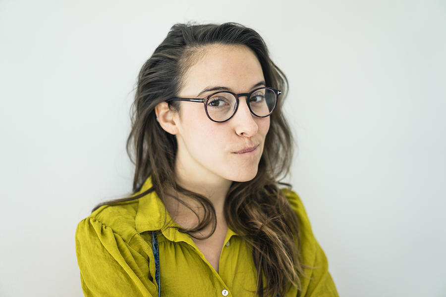 Portrait of young woman wearing glasses Photograph by Westend61