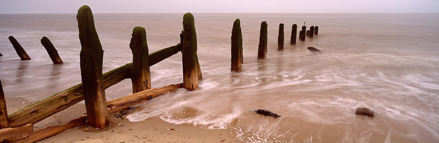 Beach Photograph - Posts On The Beach, Spurn, Yorkshire by Panoramic Images