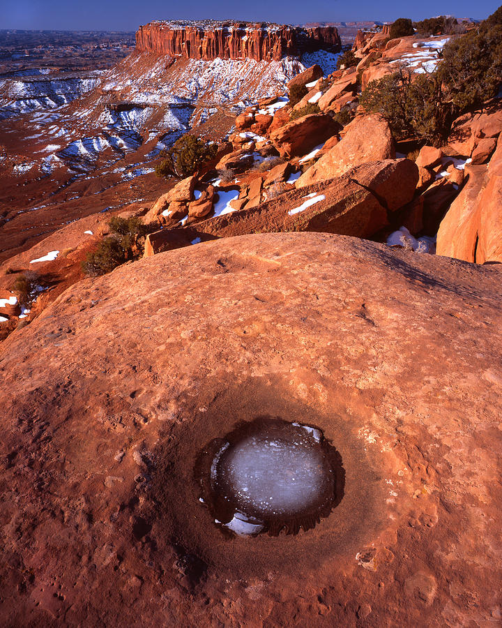 Pothole in Canyonlands Photograph by Ray Mathis