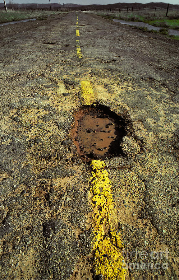 Pothole On A Country Road Photograph by Ron Sanford