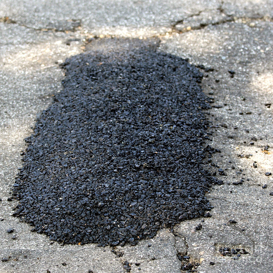 Pothole Patch Photograph by Henrik Lehnerer
