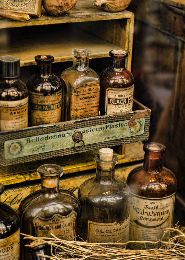 Bottle Photograph - Potions and Cure Alls by Heather Applegate