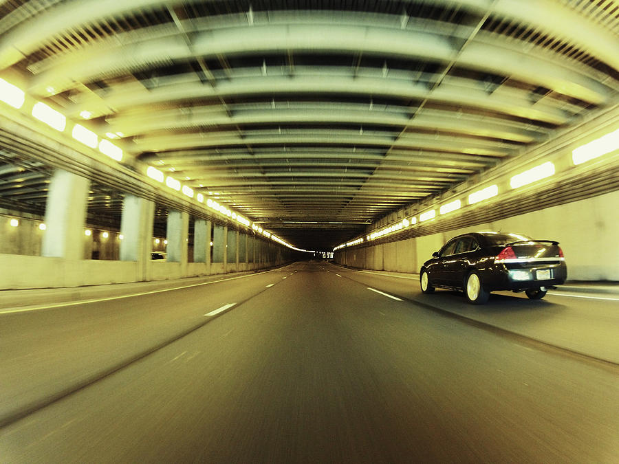 Pov Of Car Driving Through Tunnel Photograph by William Andrew