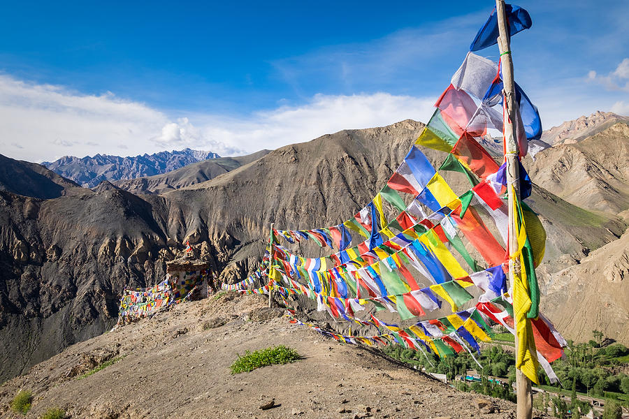 Prayer flags on the top of mountain near Lamayuru Monastery in Leh, Ladakh, Jammu and Kashmir, India Photograph by Sirintra Pumsopa