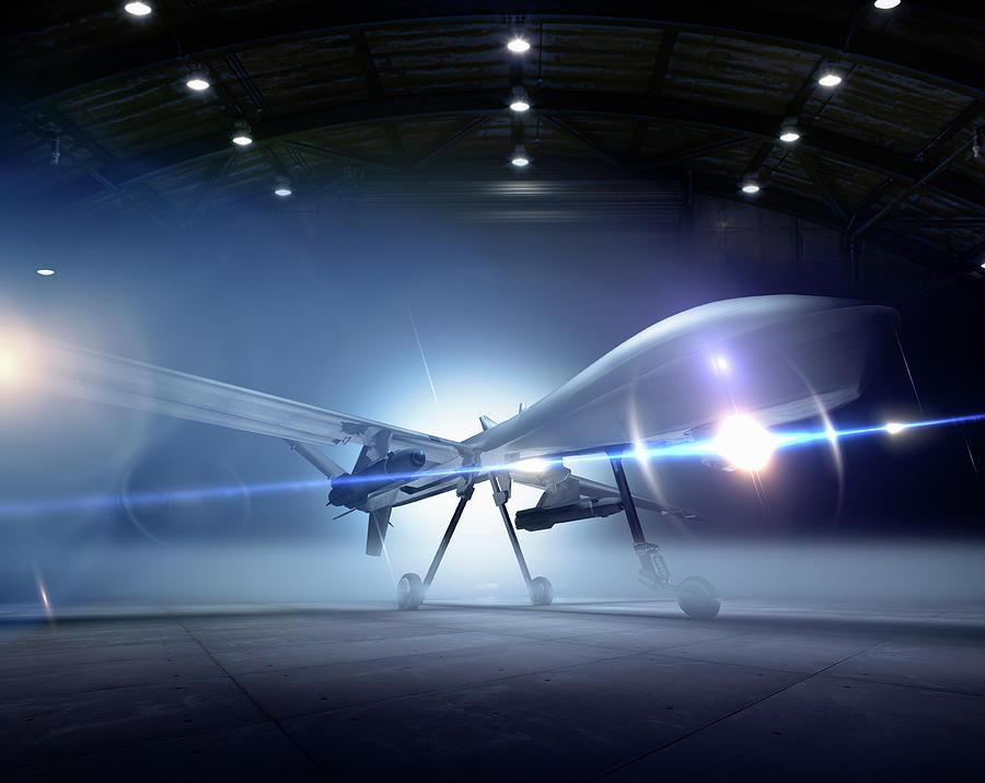 Predator Drone At The Ready In A Hangar Photograph by Colin Anderson