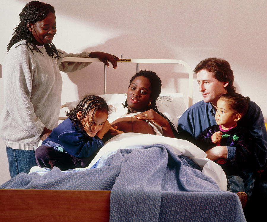 Pregnant Woman And Her Family On An Antenatal Ward Photograph by Ruth ...