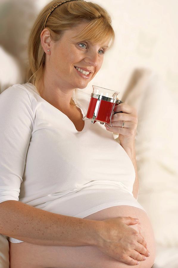 Tea Photograph - Pregnant Woman Drinking Tea by Mark Sykes