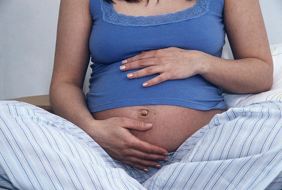 Pregnant Woman Holding Her Belly Photograph By Tracy Rutterscience Photo Library