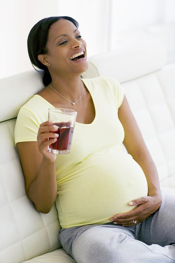 Pregnant Woman Laughing Photograph by Ian Hooton/science Photo Library