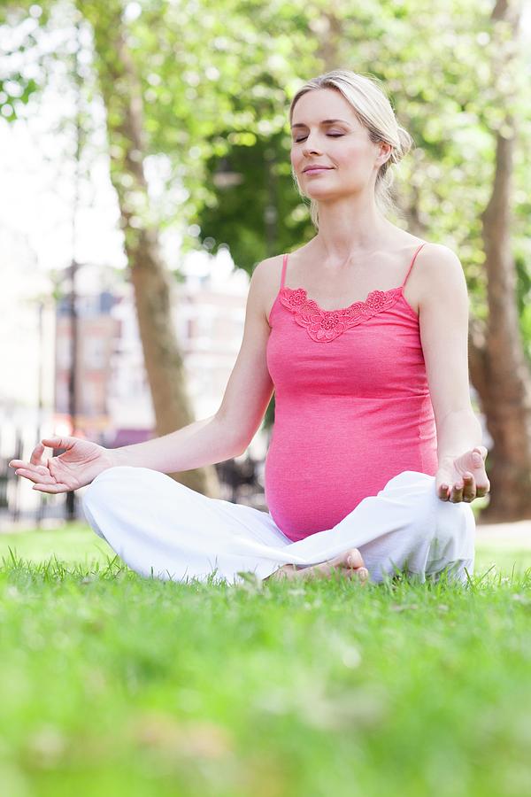 Pregnant Woman Meditating by Ian Hooton/science Photo Library