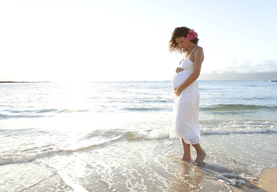 Pregnant Woman on Beach Photograph by M Swiet Productions