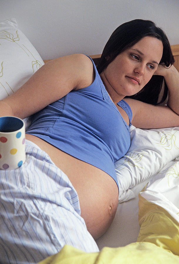 Pregnant Woman Relaxing Photograph by Tracy Rutter/science Photo Library