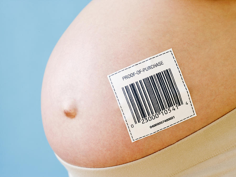 Pregnant womans belly with barcode Photograph by Jamie Grill