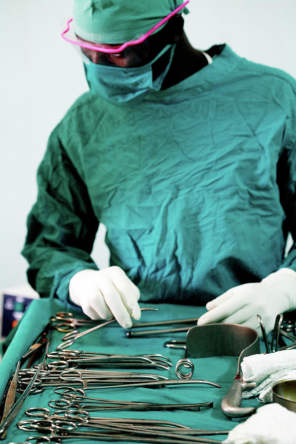 Preparing Instruments For Surgery Photograph by Mauro Fermariello/science Photo Library