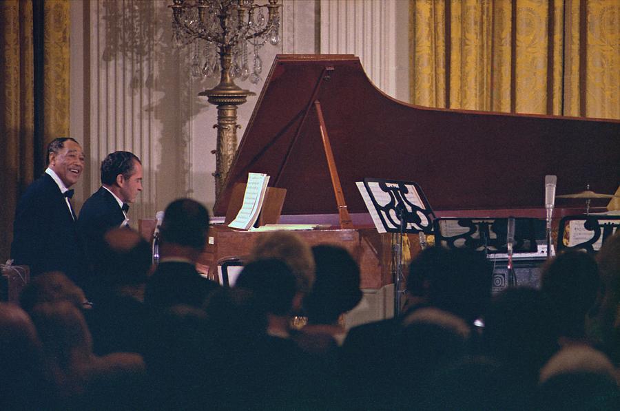 President Nixon Playing The Piano Photograph by Everett