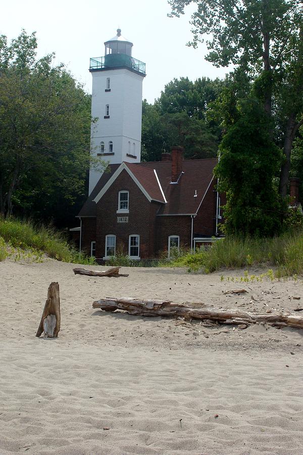 Presque Isle Lighthouse Photograph by Anthony Seeker