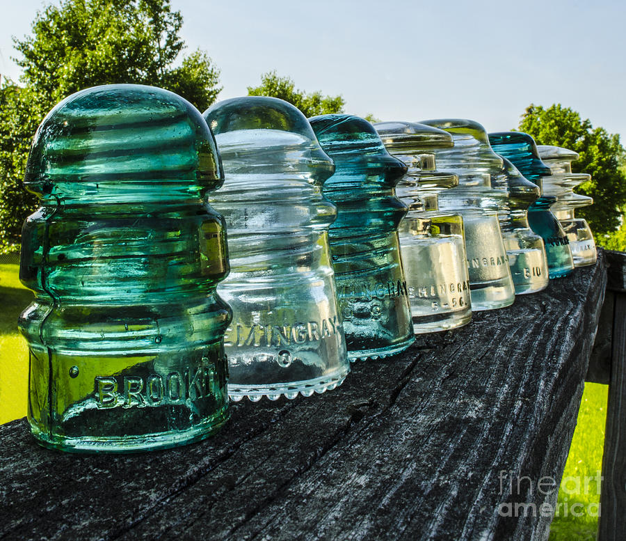 Pretty Glass Insulators All in a Row Photograph by Deborah Smolinske