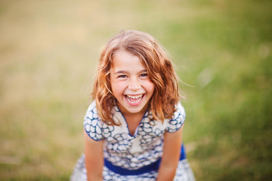 Pretty happy little girl Photograph by Photo by Rafa Elias