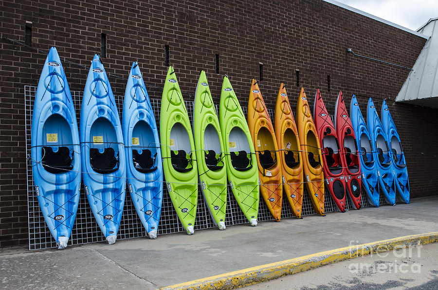 Pretty Kayaks all in a Row Photograph by Deborah Smolinske