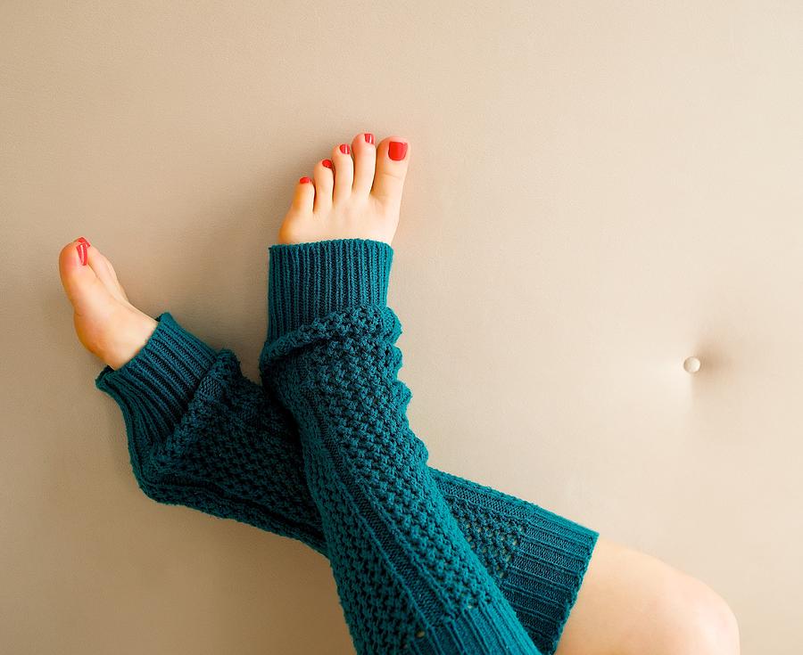 Pretty Painted toes snuggled and warm in turquoise Photograph by