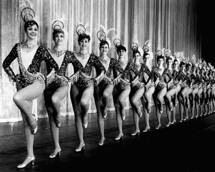 Vintage Photograph - Pretty Rockettes In Dance Line At Radio City Music Hall by Retro Images Archive
