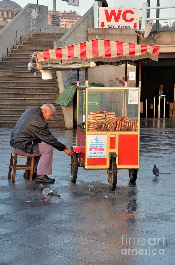 Pretzel seller with pushcart Istanbul Turkey Photograph by Imran Ahmed