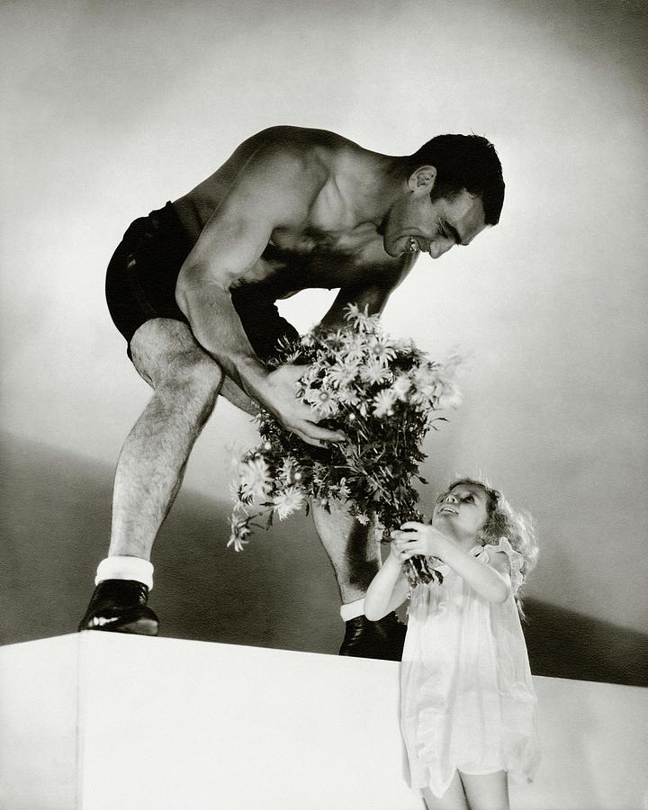 Flower Photograph - Primo Carnera Receiving Flowers From A Little by Edward Steichen