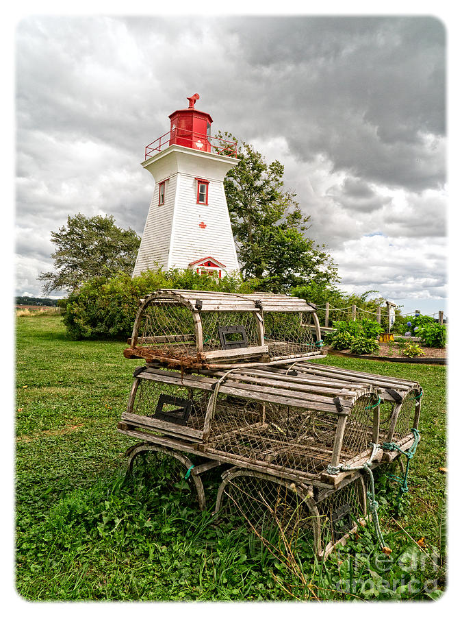 Summer Photograph - Prince Edward Island Lighthouse with Lobster Traps by Edward Fielding