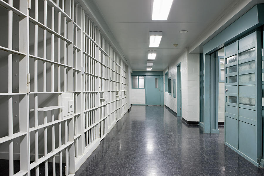 Prison corridor Photograph by Image Source