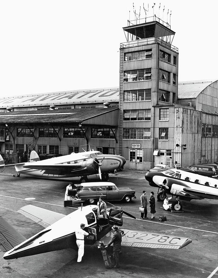 Architecture Photograph - Private Aircraft At Teterboro by Underwood Archives