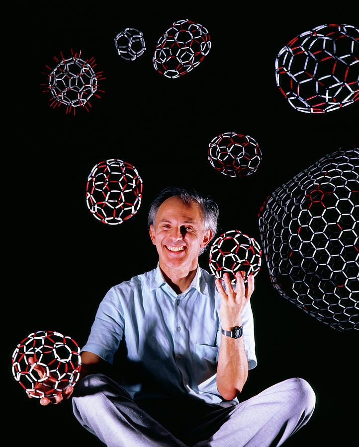 Prof Harold Kroto & Models Of Buckyballs Photograph by Geoff Tompkinson/science Photo Library