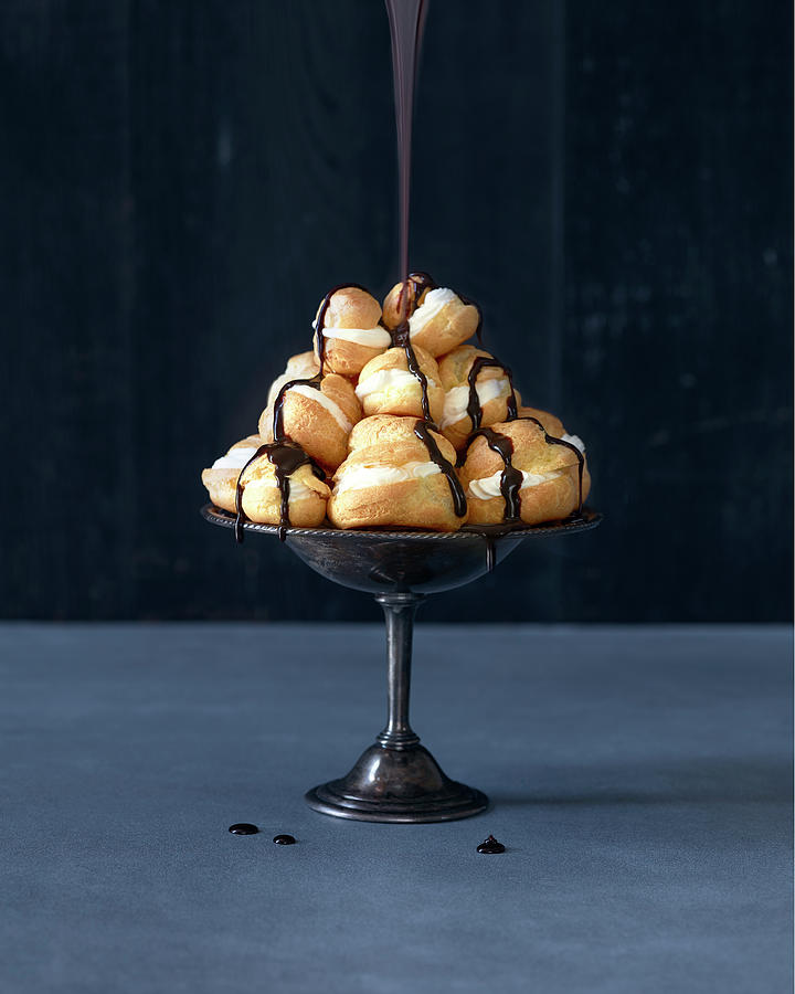 Profiteroles Chocolate Drizzle Pour Photograph by Annabelle Breakey