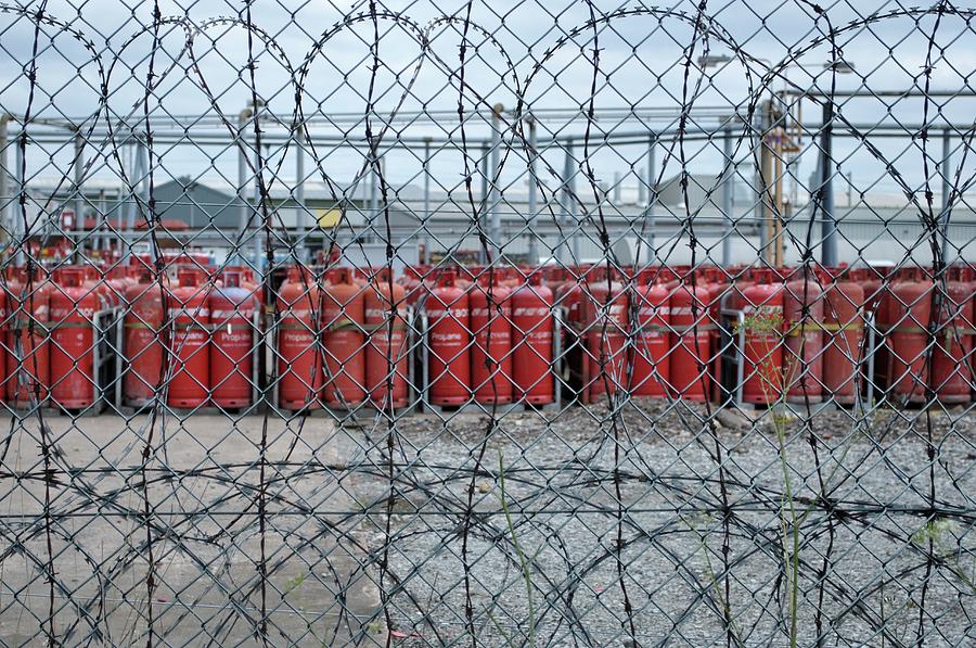Propane Canisters In Secure Compound Photograph by Robert Brook/science