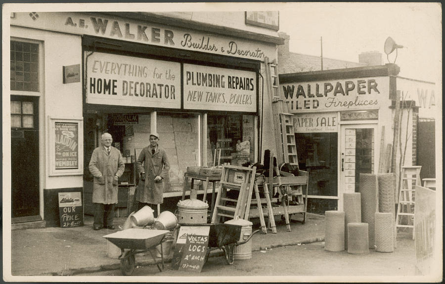 Ironmonger Photograph - Proprietors Of An Ironmonger  Stand by Mary Evans Picture Library