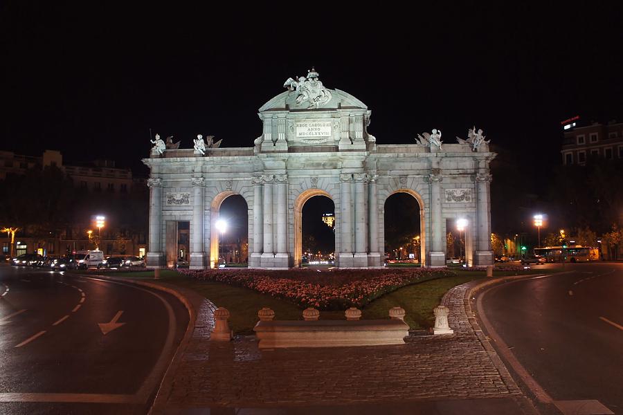 Puerta de Alcala at Night Photograph by Jenny Hudson