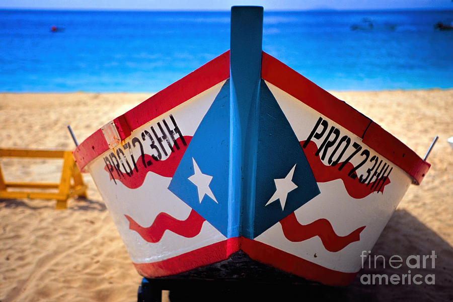 Beach Photograph - Puerto Rican Flag Painted Fishing Boat by George Oze