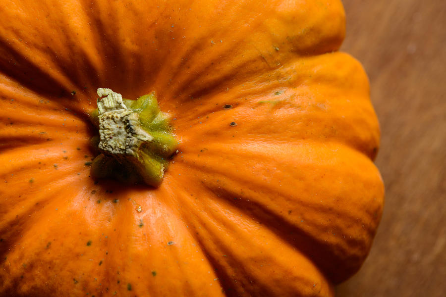 Pumpkin on wooden background Photograph by Dutourdumonde Photography