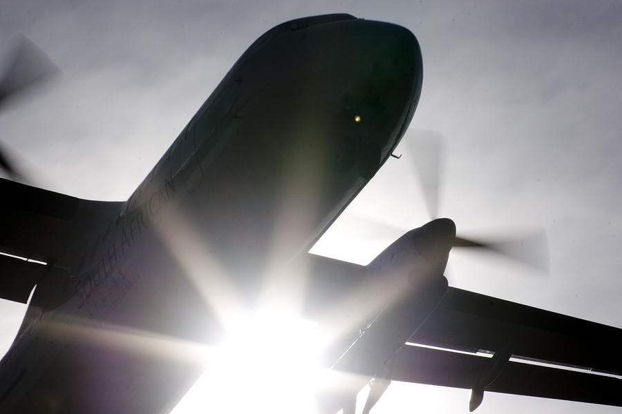 Q400 Silhouette Photograph by Paul Job