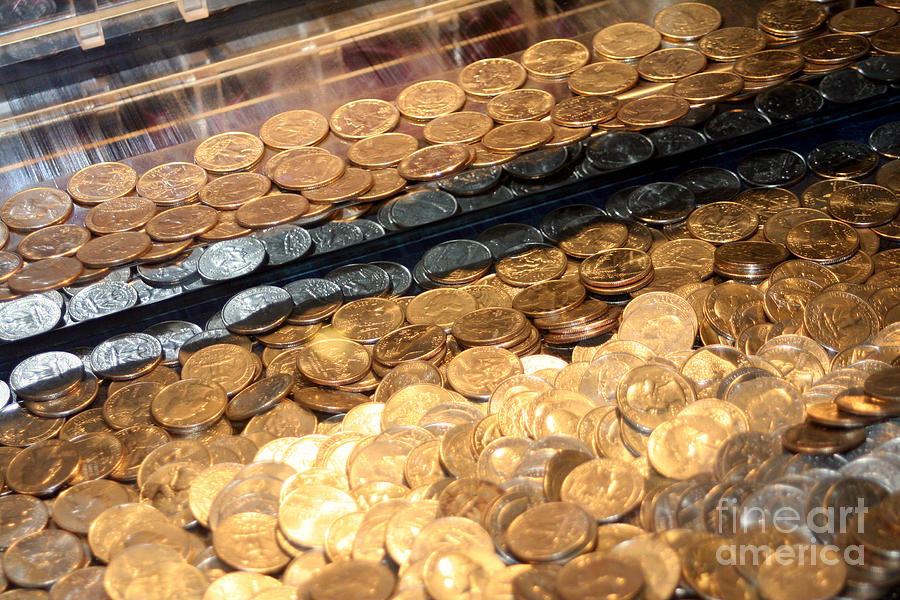 Quarters In An Arcade Game Photograph by Susan Stevenson
