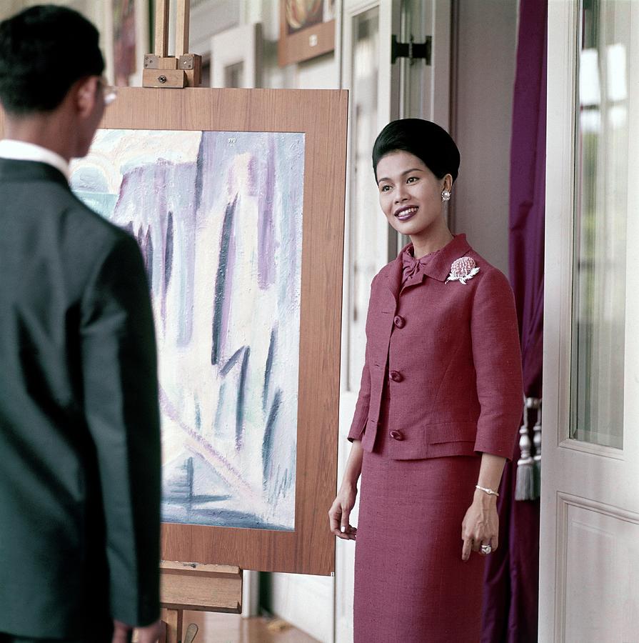 Queen Sirikit Of Thailand Looking At A Painting Photograph by Henry Clarke