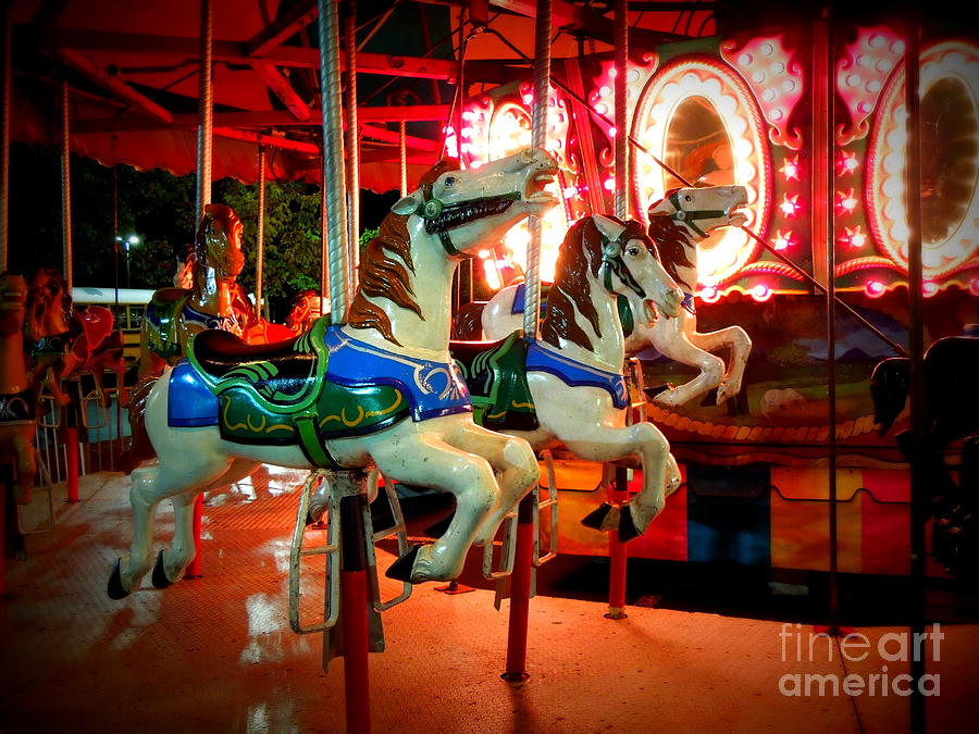 Race of the Carousel Horses Photograph by Renee Trenholm