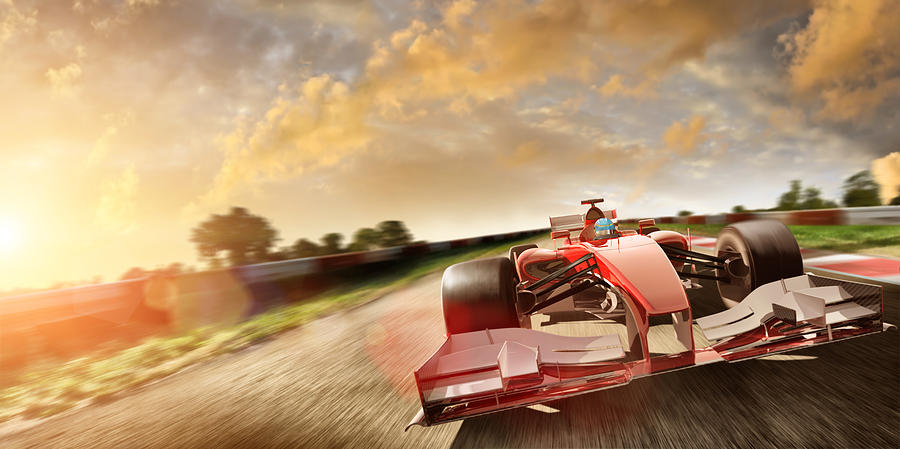 Racing Car At Speed In Summer Sunset Photograph by Peepo