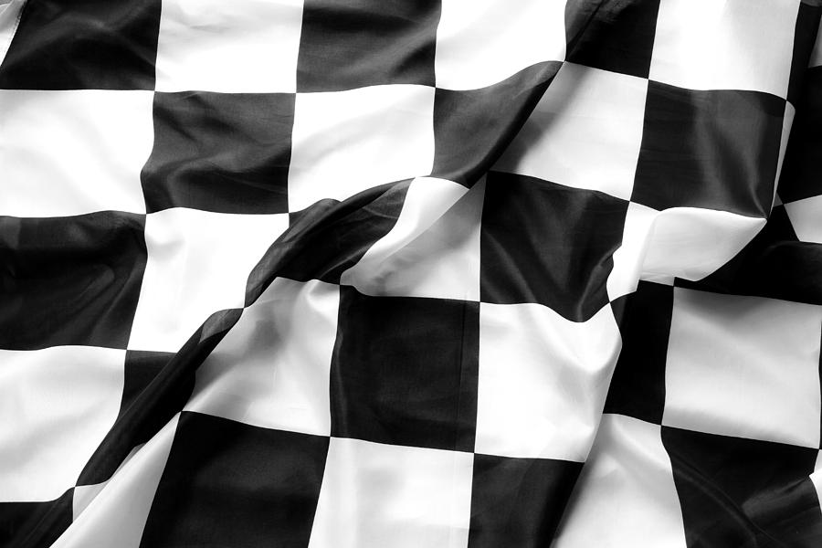 Abstract Photograph - Racing flag by Les Cunliffe