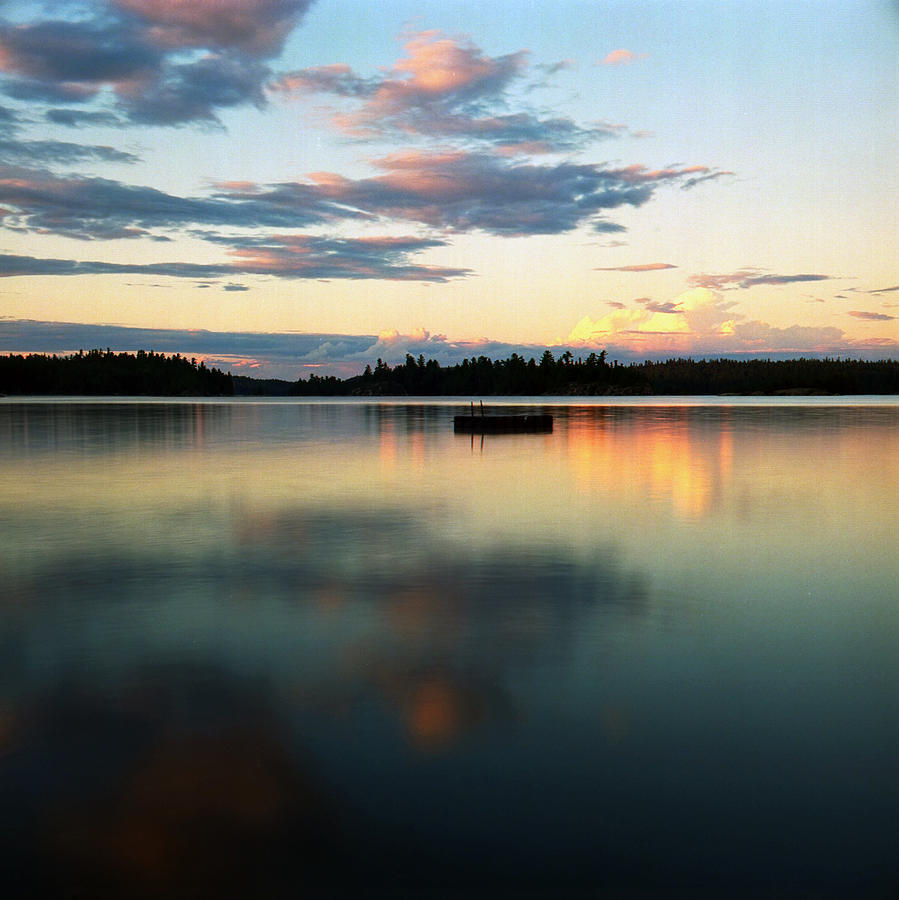 Raft at dusk Photograph by Leonid Rozenberg | Fine Art America