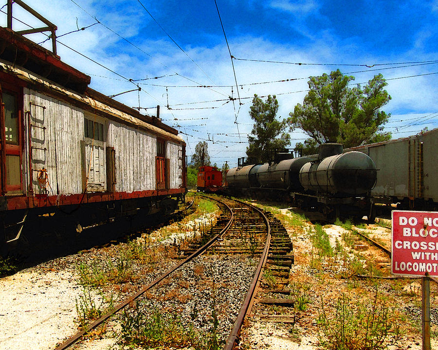 Rail Yard Caboose Photograph by Timothy Bulone